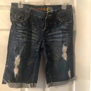 Jean shorts with paint splatter